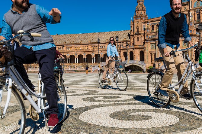 12 o'Clock - Bike & Tapas Tour Seville - Torre Giralda: minaret roots under a cathedral bell tower