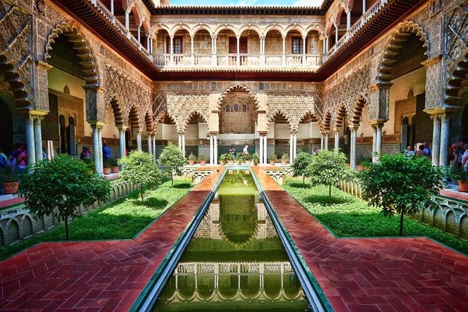 Alcazar Guided Day Tour in Seville - Entering the Real Alcázar: Gothic-Moorish Palaces and Lush Courtyards