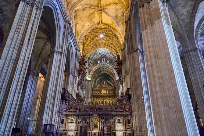 Cathedral and Giralda Tour - Inside Seville Cathedral: altarpiece, stained glass, choir, and Columbus