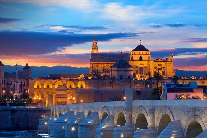 Cordoba City Tour with Mosque-Cathedral from Seville - Calahorra Tower and the Roman Bridge Walk: Getting Your Bearings Fast