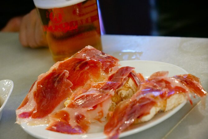 Eating Seville: Tapas, Drinks and Local Flavors Tour - Inés Rosales Olive Oil Cakes: A 1910-Founded Sweet Stop with Orange Wine