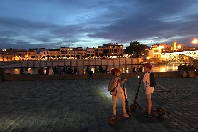 Electric Scooter Rental Seville - Palacio de San Telmo and the shift to Maria Luisa Park