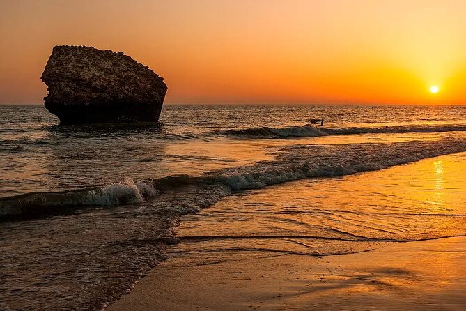 Excursion to the beaches of Huelva from Seville - Private tour - Playa del Parador: Yellow Cliffs and a Long 5-Hour Beach Block