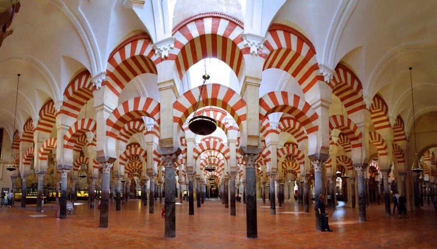 From Seville: Private Transfer to Granada and Córdoba Tour - Seville pickup and the air-conditioned ride to Córdoba