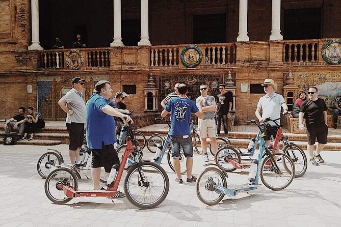 Kickscooter electric tour Sevilla - Archivo de Indias area, Antigua Tabacalera, and Plaza España