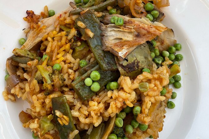 Paella Dining Experience - From Drinks to Starters: Local Cheese and Marinated Olives