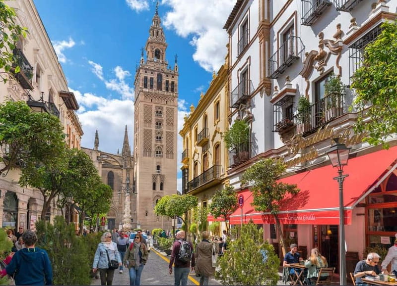 Private Guided Tour of Complete Seville and Jewish Quarter - Arenal and the Guadalquivir River: commerce, culture, and flamenco energy