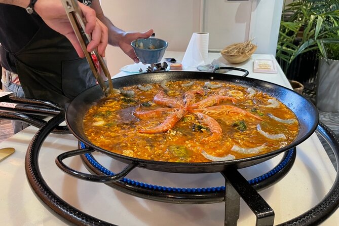 Sangria Tasting & Paella Showcooking Experience - A rooftop food show that starts right in central Seville