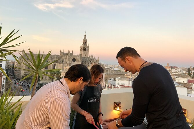 Sevilla: Rooftop Paella Cooking Class & 30-minute expert Q&A - Take-home recipes and the surprise gift that extends the night