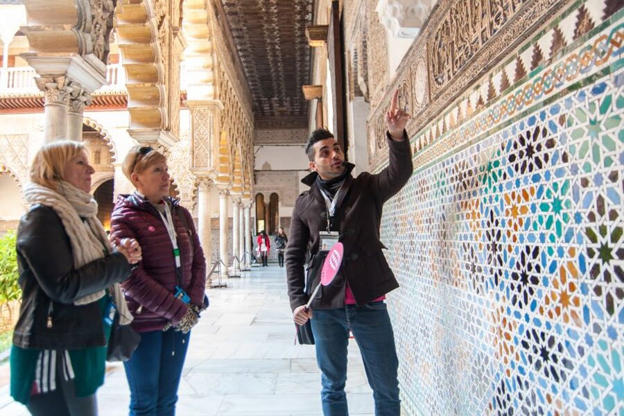 Seville: Alcázar and Cathedral Entry Ticket and Guided Tour - Inside the Alcázar: Muslim rulers, royal rooms, and gardens with stories