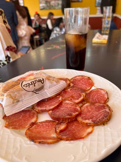 Seville: April Fair Guided Walking Tour with Tapas & Drinks - Learning the tradition while you walk: history without the lecture