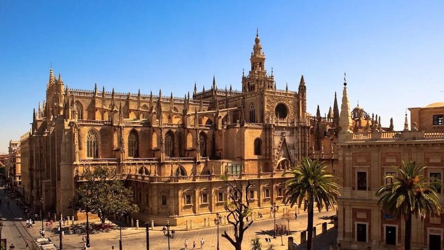 Seville Cathedral and Giralda Tower Guided Tour and Tickets - Seville Cathedral Highlights: Stained Glass, Renaissance Art, and Columbus