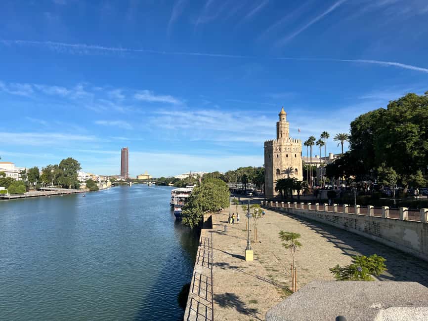 Seville: City Walking Tour & Plaza España - Antigua Fábrica de Tabacos: Seville’s work history shows up in the architecture