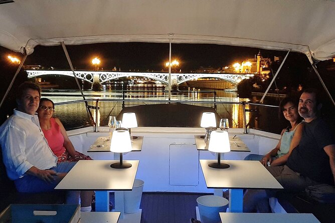 Seville: Cruise along the Guadalquivir River with appetizer - A 90-minute Guadalquivir break with ham, cheese, and a drink