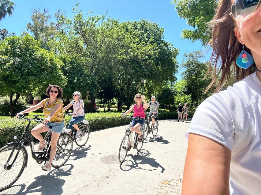 Seville: Dutch Cycling Highlights Tour with local guide - San Telmo Palace and the Urban Story Your Guide Connects