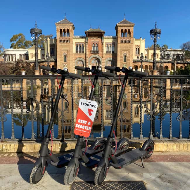 Seville: Electric Stand-Bike Tour - Torre del Oro and the Guadalquivir River: history on a scenic stretch
