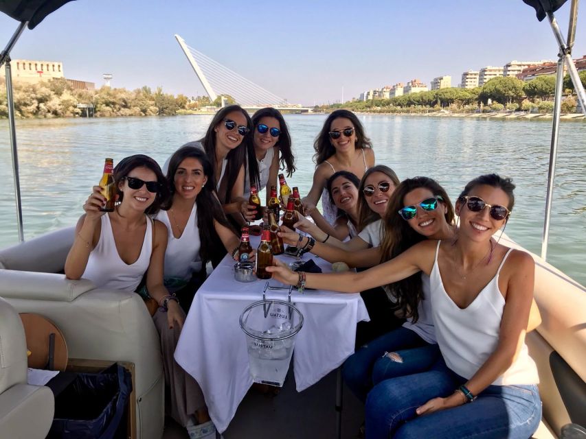 Seville: Exclusive River Boat Tour with Tapas - Triana Bridge area: old ironwork from the water