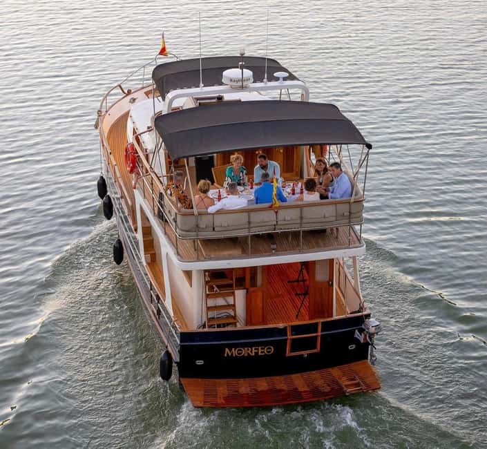 Seville: Flamenco life music Yacht Cruise, Tapas & Drinks - Boarding at Muelle New York and getting set up