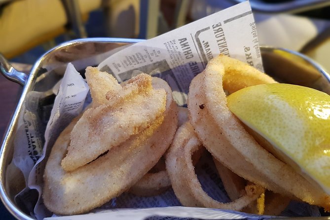 Seville Food Tour: Tapas, Drinks and Delights with a Local - Cathedral and Giralda area: montadito de pringá plus local drinks