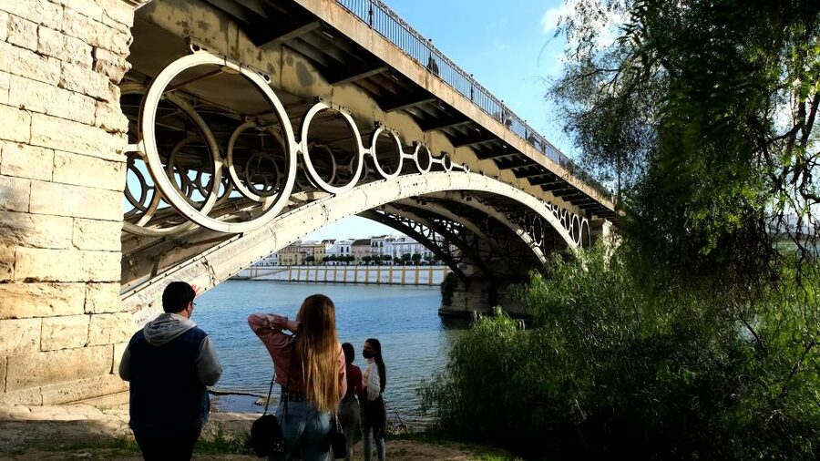 Seville: Guadalquivir & Secrets of Triana Small Group Tour - From Torre del Oro to the port mindset: your route starts with the right question