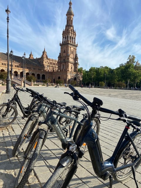 Seville: Guided Tour by Electric Bike - Plaza de España: A 1929 Expo Stop Made for Photos