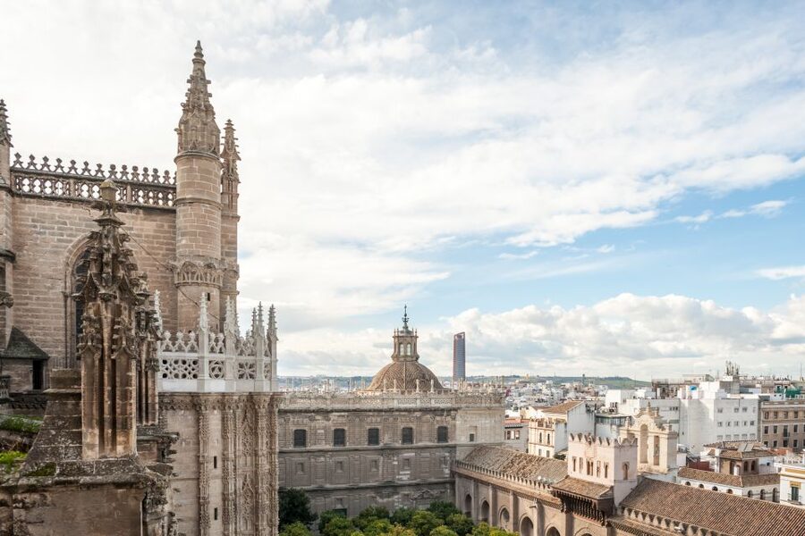 Seville Guided Tour: Cathedral, Giralda & Optional Alcázar - Inside Seville Cathedral: Gothic Scale With a Clear Story