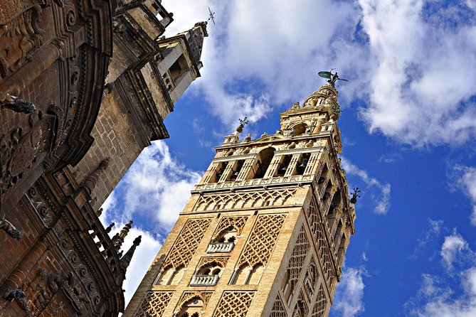 Seville Guided Tour into Alcazar and Cathedral Skip the Line - Giralda Tower: the minaret that became a bell tower