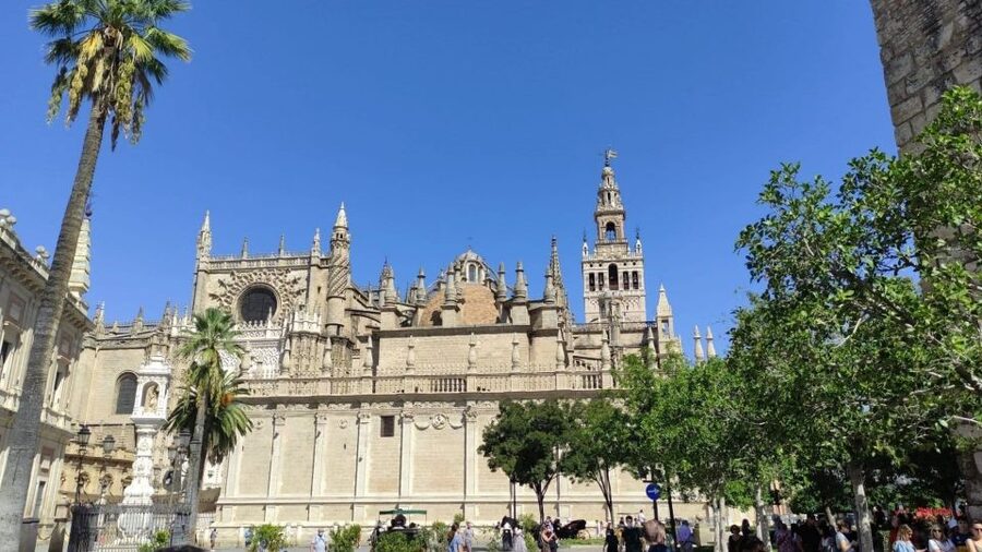 Seville: Guided Walking Tour with Optional Breakfast - Archivo de Indias and Puerta de Jerez: The City Gets Global