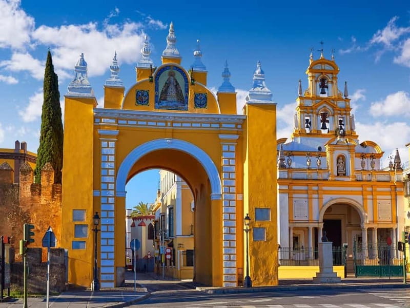 Seville: Highlights & Hidden Gems - Unique NL Bike Tour - Expo-era streets: 1929 pavilions, riverside views, and the Triana Bridge angle