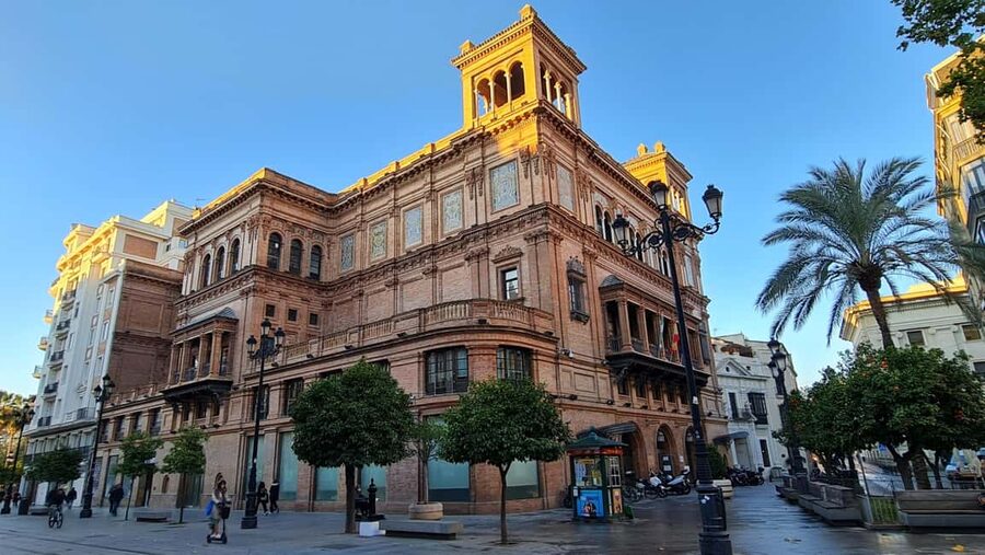 Seville in 1 Day Tour: Historic Center, Monuments, and Jewish Quarter - Plaza del Cabildo, Mercado El Postigo, Puente de Isabel II, and Torre del Oro