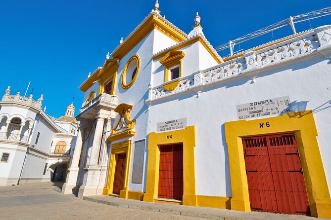 Seville Maestranza Bullring Tour with Audio Guide - Stepping into the arena: bullpens, chapel, and matadors’ rooms