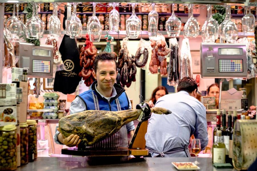 Seville: Morning Market & Tapas Tour - Starting in Macarena: churros first, questions later