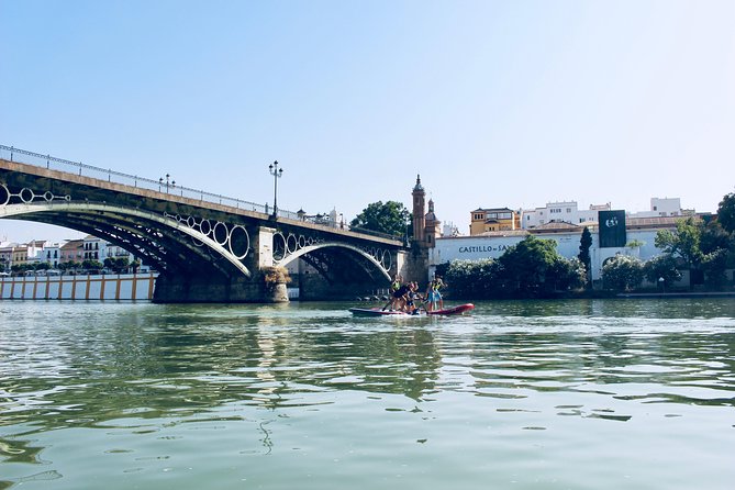 Seville: Paddle Surf on an XXL Board - Puente de San Telmo to Torre Sevilla: Finishing with Modern Contrast and a Splash of Energy