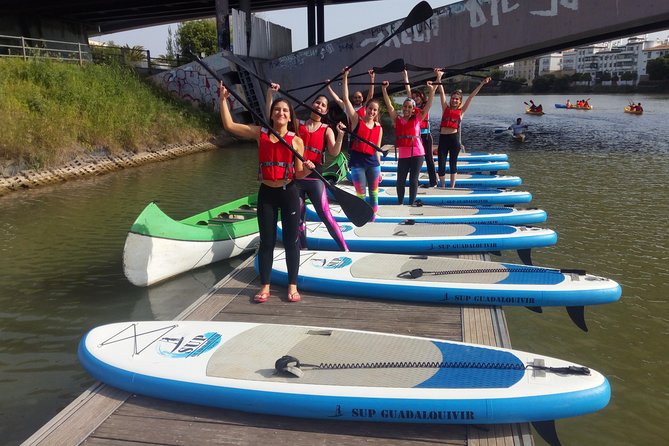 Seville Paddle Surf Sup in the Guadalquivir River - Puente de Isabel II (Puente de Triana): going under the bridge