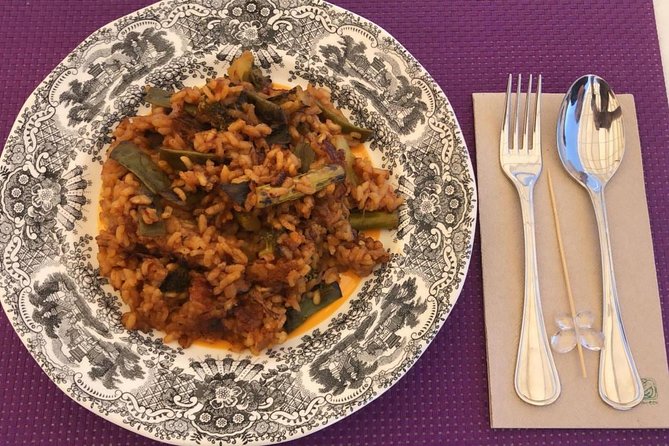 Seville: Paella Showcooking Experience - The rooftop paella moment: dinner with city views