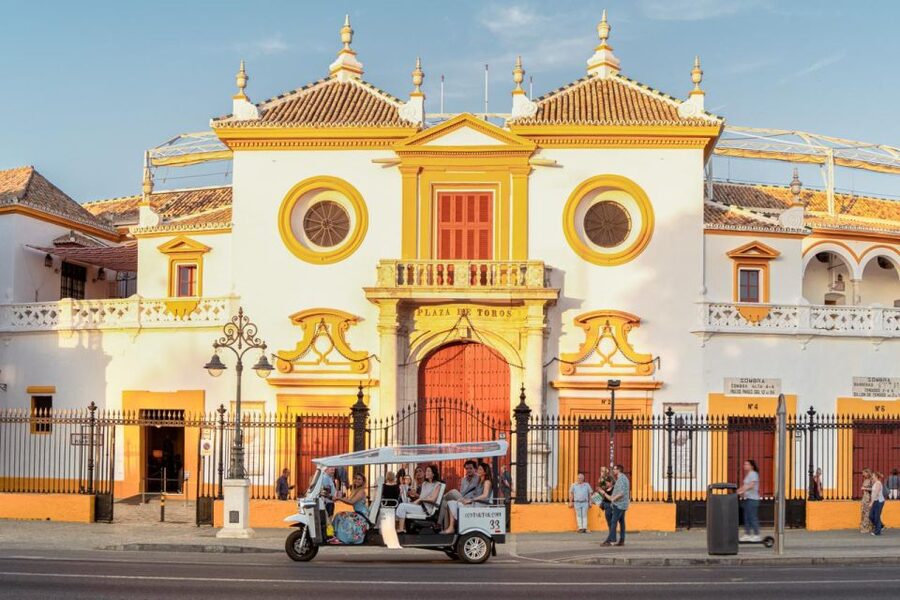 Seville: Private City Tour by Eco Tuk Tuk - Torre del Oro and Real Maestranza: iconic exteriors you can spot from far away