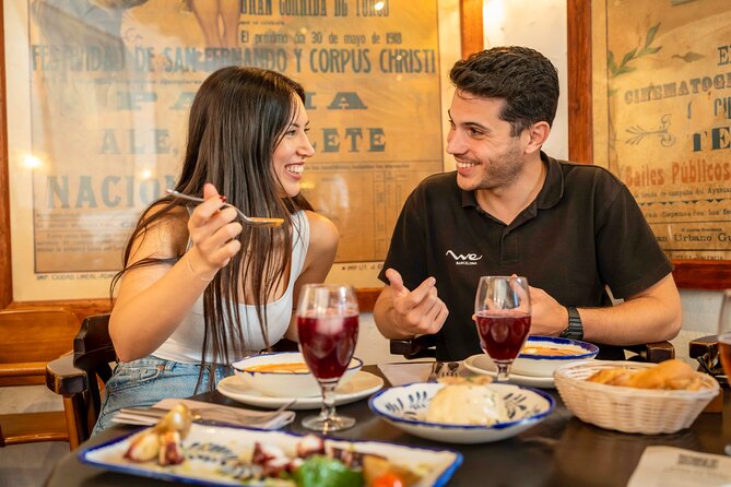 Seville Private Tapas & Wine Experience with Flamenco Show - Casco Antiguo streets and your first Andalusian tavern
