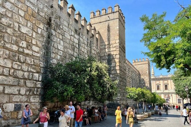 Seville Private Tour with Alcazar, Cathedral, Casa de Pilatos - Alcázar de la Puerta de Sevilla: Moorish fortress roots and royal apartments