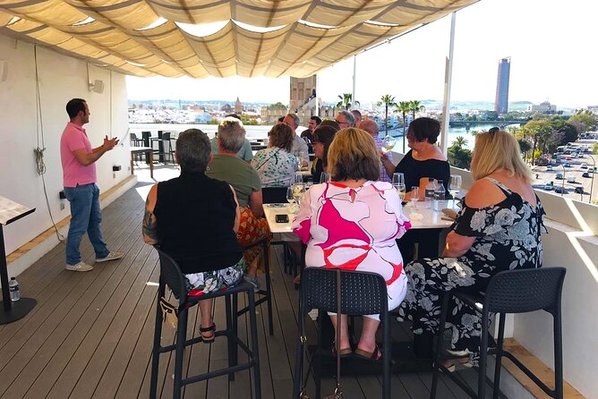 Seville: Rooftop Paella Showcooking and Sangría - Where you meet in Seville (and what to expect for timing)