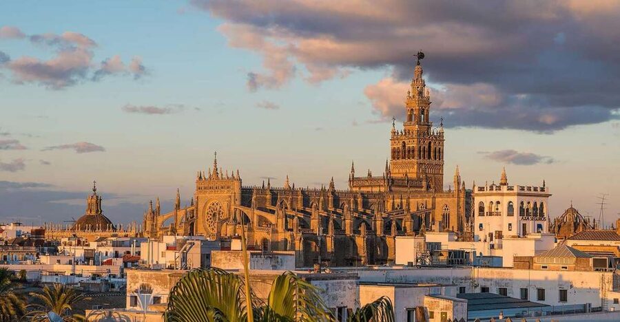 Seville: Royal Alcazar, Cathedral, and Giralda Tower Tour - Inside Seville Cathedral: Built Scale and the Human Stories Behind It