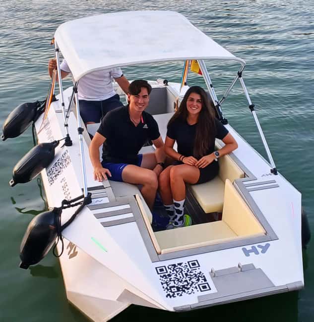 Seville: Sail the River. 100% private - The landmarks: Triana Bridge, Torre del Oro, and Plaza de Toros