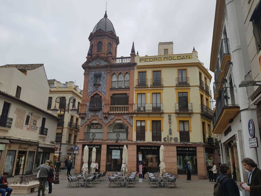 Seville: Salvador Church, Casa Pilatos, and Metropol Tour - Walking through the Arabic Seville heart: street life and event outfits