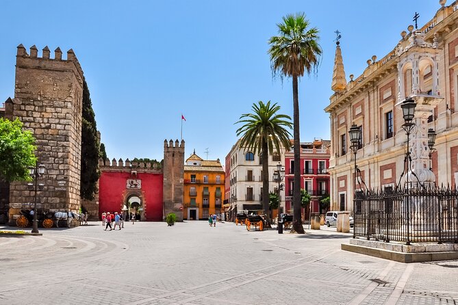 Seville Scavenger Hunt and Highlights Self Guided Audio Tour - Torre del Oro: a landmark you see twice—once, then again