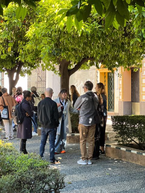 Seville: Small Group Jewish Quarter Tour with Tapas & Drinks - Santa Cruz Square and Jardines de Murillo: A Neighborhood That Breathes
