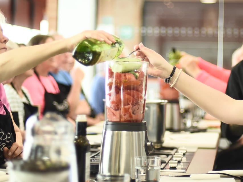 Seville: Spanish Cooking Class with Dinner - The class vibe: English-led cooking with rotating chef energy