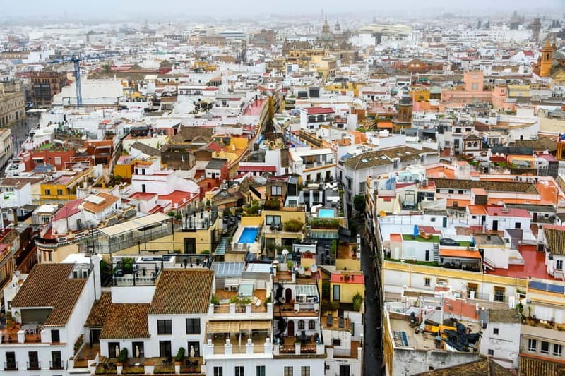 Seville: Sunset Roof Top Walking Tour - Rooftop Views of La Giralda, Cathedral, and Alcázar Walls