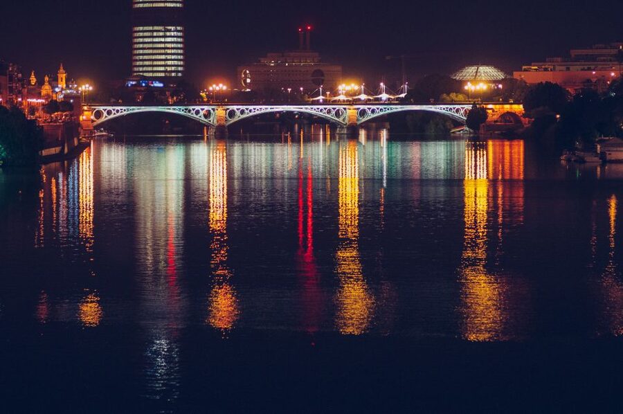 Seville: Tapas Tour Across the River in Triana - Puente de Isabel II and the river moment that makes it feel like Seville