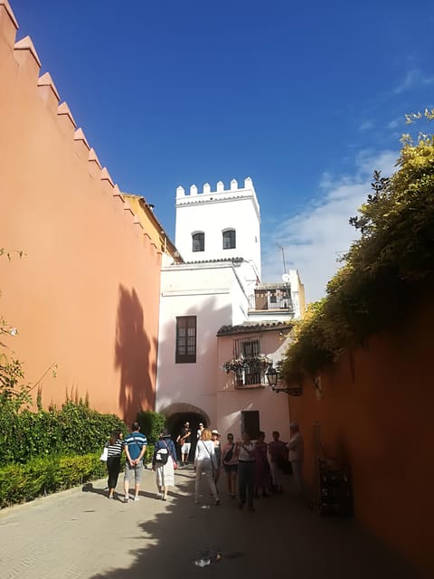 Seville: Tiny-Group Medieval Quarter Discovery Walking Tour - Why the Santa Cruz streets feel like a living museum