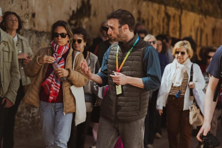 Seville: Tiny-Group Medieval Quarter Discovery Walking Tour - Patio de Banderas: palace-era Seville energy in miniature