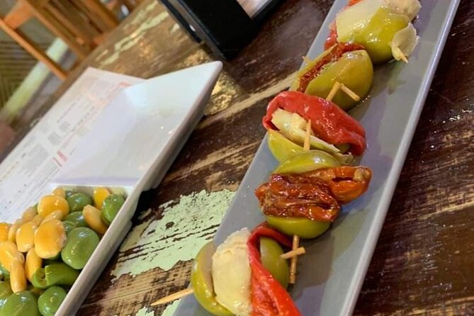 Seville Vegan Tapas Food and Market Walking Tour - How the stops connect to Andalusian cuisine